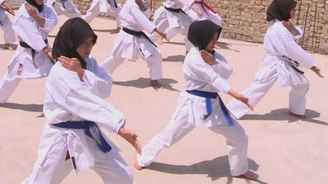 Children in Pakistan practice martial arts