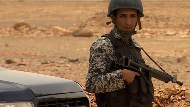 Armed Jordanian soldier in the country's desert brigade on duty near border with Iraq