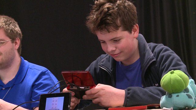 Jack playing Pokemon on his gaming console