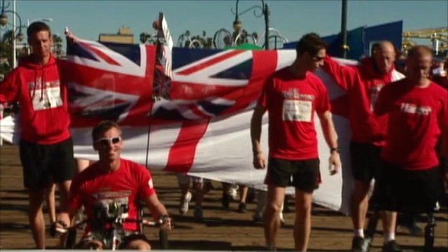 The servicemen cross the finishing line
