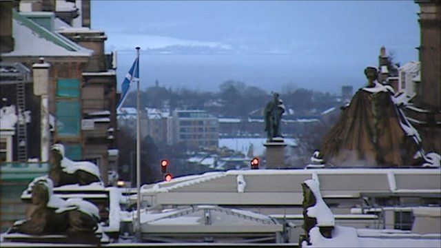 Scottish flag flying in city