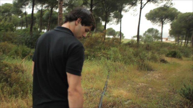 Ramon tracks a pipe from an illegal borehole