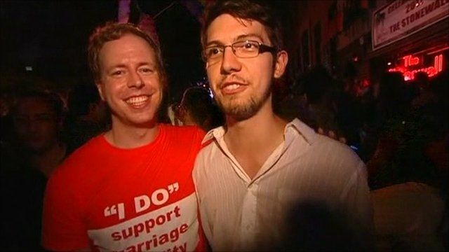 A gay couple celebrates in New York