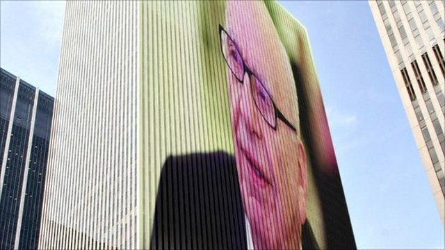 Image of Rupert Murdoch on building