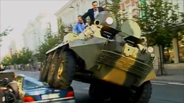 Mayor of Vilnius, Arturas Zuokas, crushes an illegally parked car