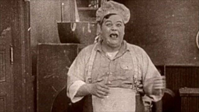 Roscoe "Fatty" Arbuckle in silent film The Waiters' Ball