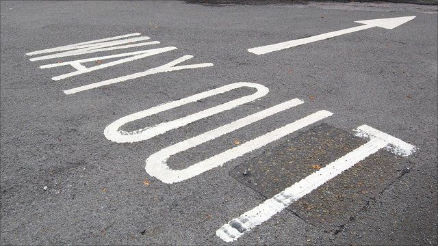 way out road marking