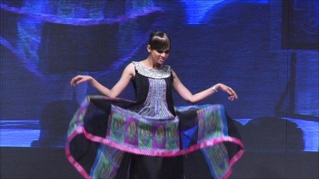 Pakistani model performs at Karachi Fashion Week