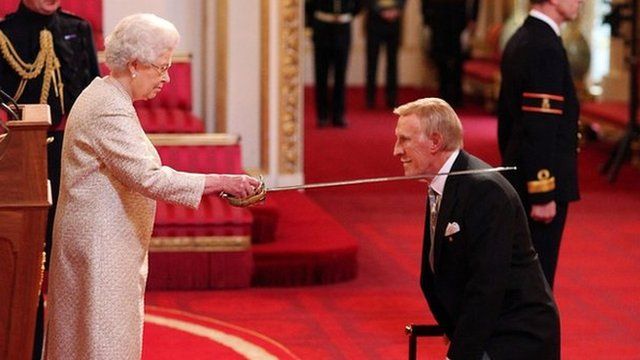 Sir Bruce Forsyth is knighted by Queen Elizabeth II