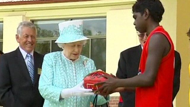 Queen receives Aussie rules football