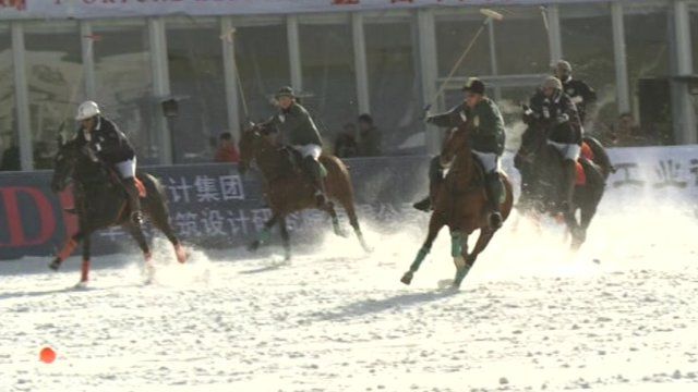 Players playing snow polo