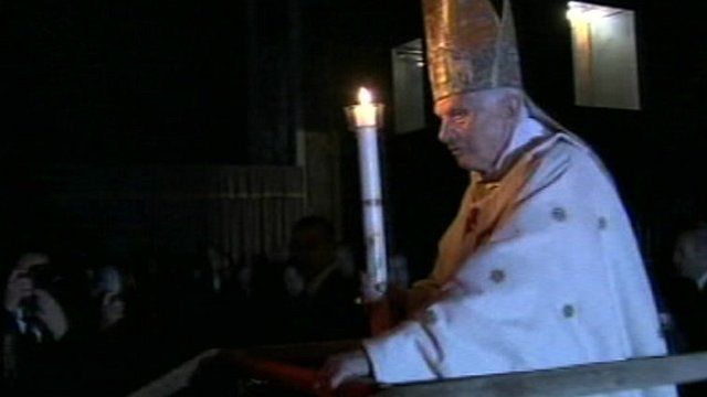 Pope Benedict arriving in a darkened St Peter's