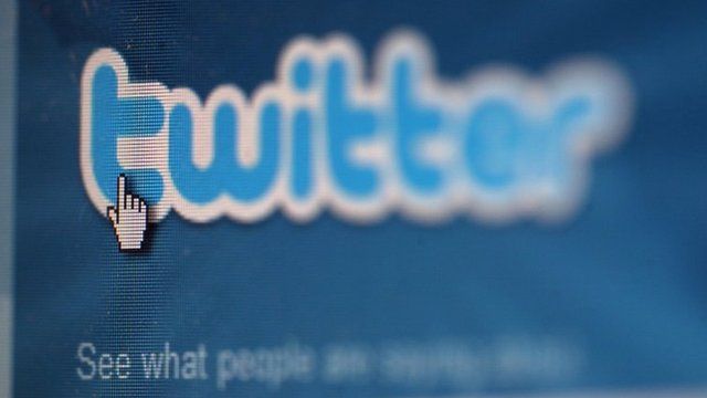Twitter icon displayed on a laptop