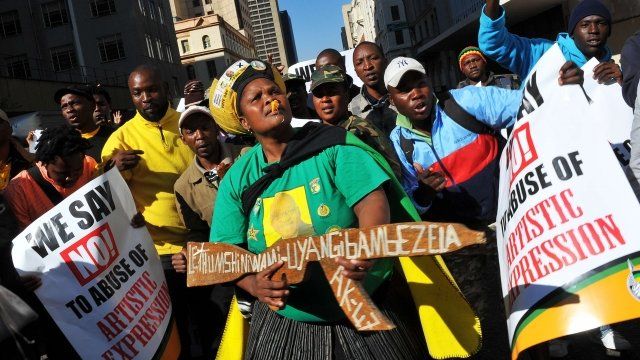 Supporters of the African National Congress demonstrate outside the Johannesburg court