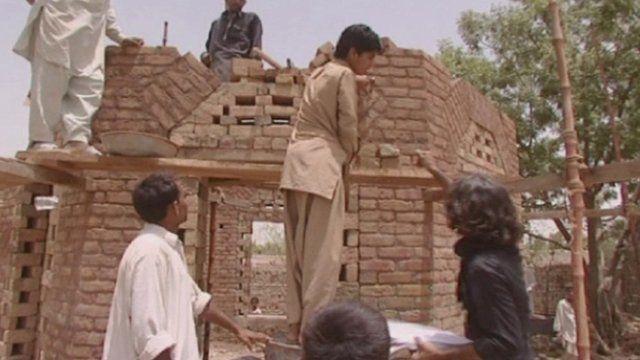 Villagers constructing mosque in Pakistan