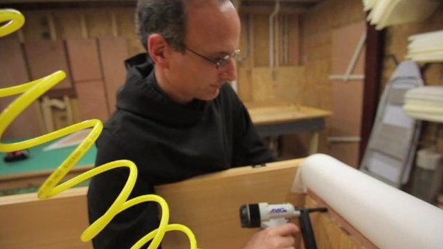 Monk making a coffin