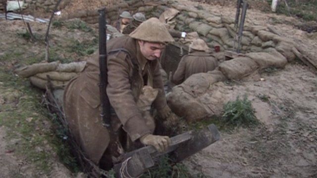 Surrey "soldier" getting out of a trench