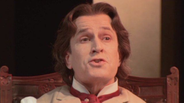 Rupert Everett playing Oscar Wilde