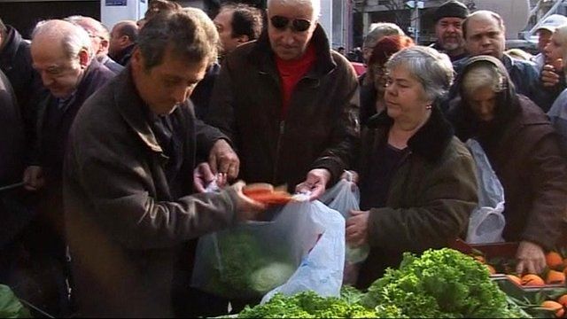 Greek farmers giving away vegetables