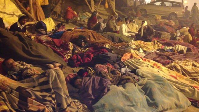 Devotees sleeping in the street
