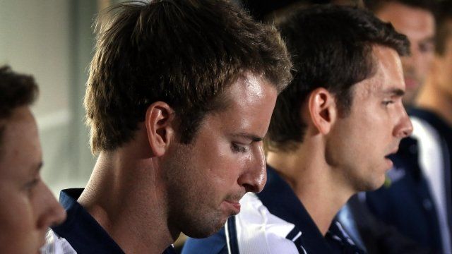 James Magnussen (2nd L) with teammates Cameron McEvoy (L) and Eamon Sullivan (R) from Australia's 4x100m freestyle relay team give a news conference in Sydney
