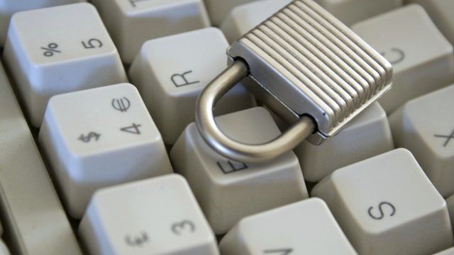 Computer keyboard and padlock