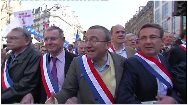 Men march in Paris