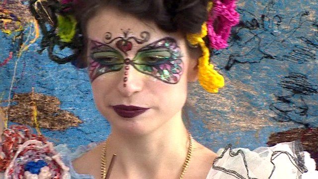 woman with painted face mask