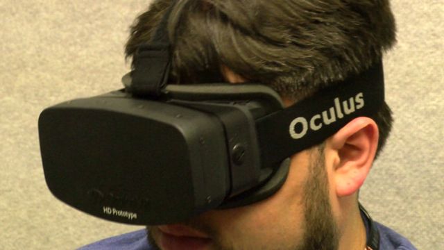 A man wearing an Oculus Rift headset