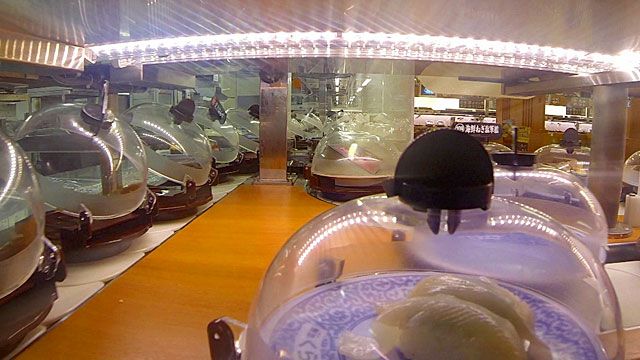 Plates on a conveyer belt