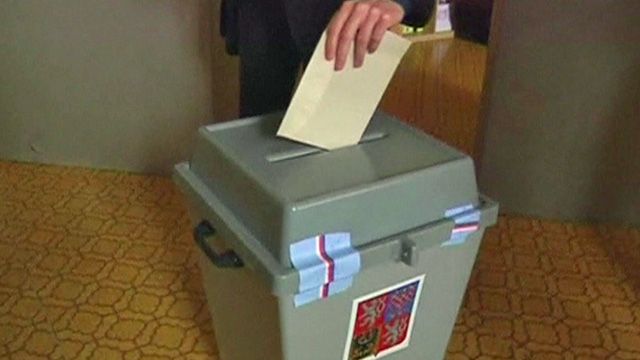 Ballot papers being put into box