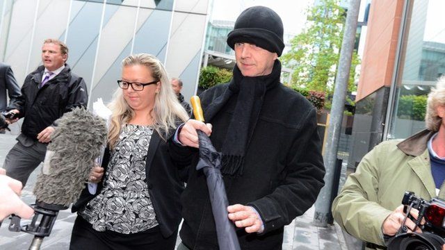 Ray Teret (centre), 72, Jimmy Savile"s former flatmate and chauffeur, leaves Manchester Magistrates Court