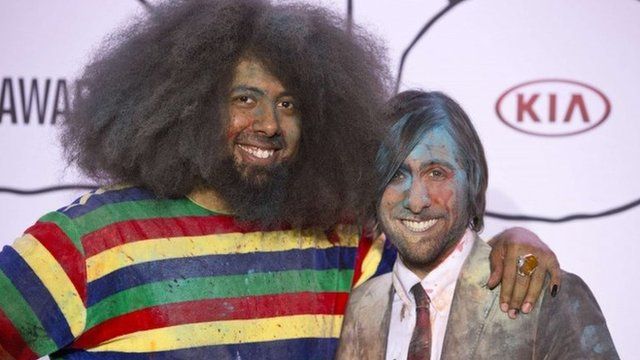 Reggie Watts and Jason Schwartzman pose for a photo after hosting the YouTube Music Awards in New York November 3, 2013