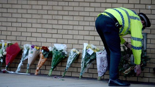Flowers at the scene of the crash