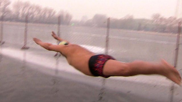 Man diving into water