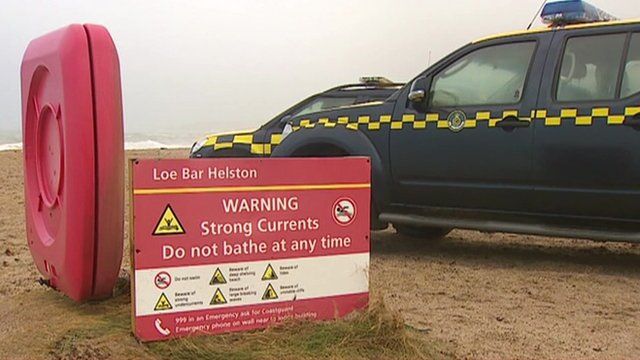 Warning signs on Cornish beach