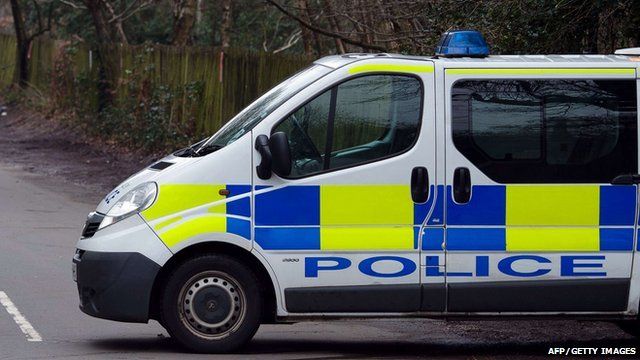 A parked police van