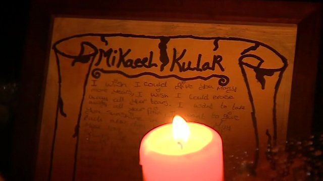 Candle and tribute for Mikaeel Kular