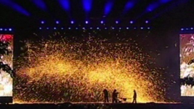 Molten lava is thrown against a cold wall, creating sparks