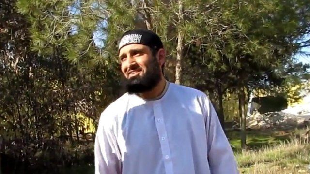 Still from video appearing to show Abdul Waheed Majid