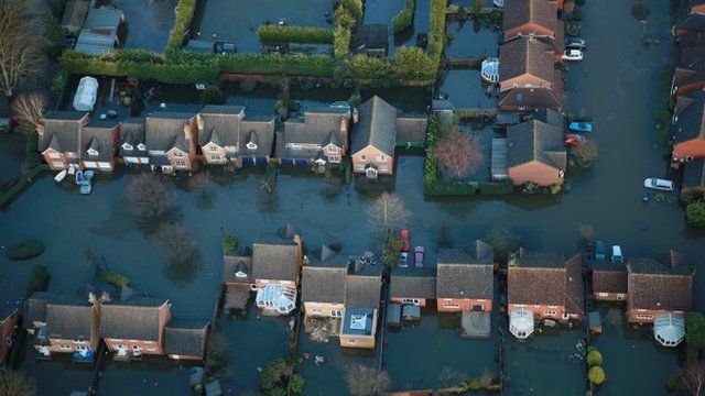 Aerial view of flooded houses in the Thames Valley