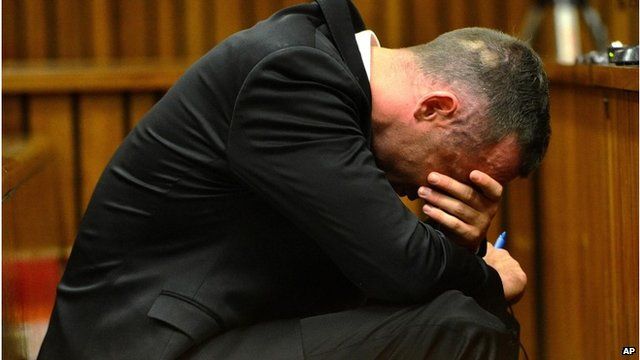 Oscar Pistorius holds head in hands in court on May 5 2014