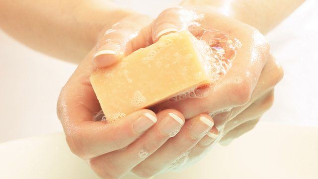Woman washing hands