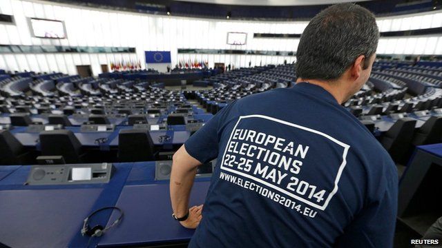 A man visits the plenary room of the European Parliament in Strasbourg