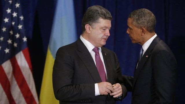 US President Barack Obama, right, meets with Ukraine president-elect Petro Poroshenko in Warsaw, Poland, Wednesday, June 4, 2014