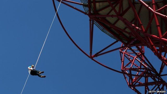 Sir Matthew Pinsent abseils from the ArcelorMittal Orbit