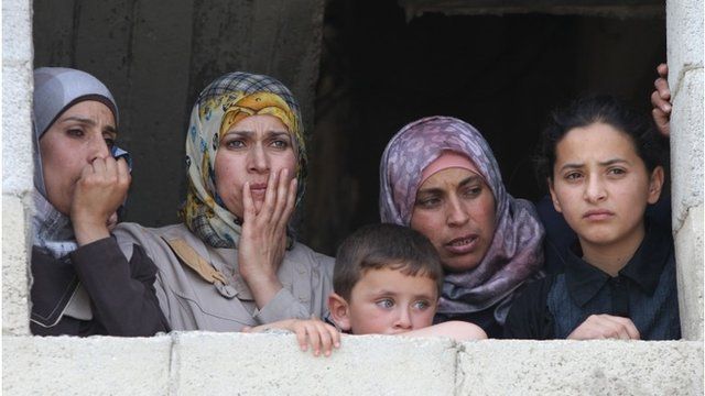 Relatives of Mohammed Dudin mourn during his funeral