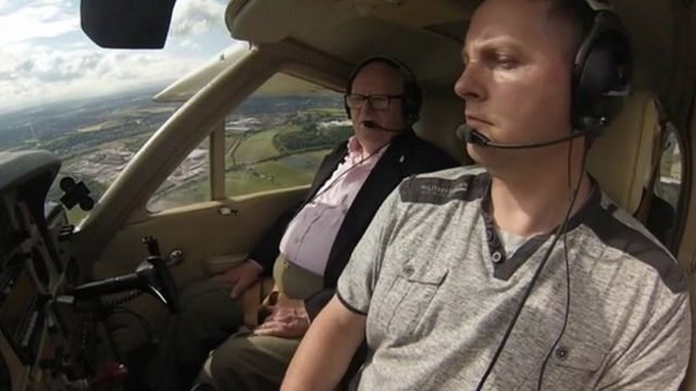 Mike Warren, left, and pilot Colin Granton