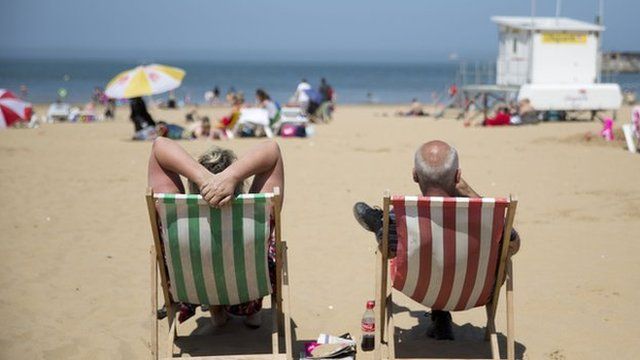 Sunbathers on a beach