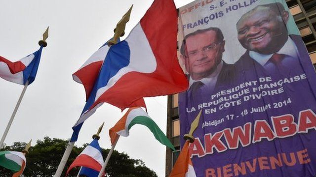 A poster of the French and Ivory Coast presidents